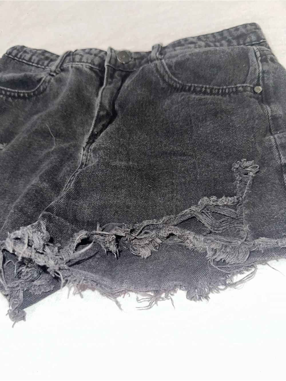 Distressed Black Denim Women's Cutoff Shorts